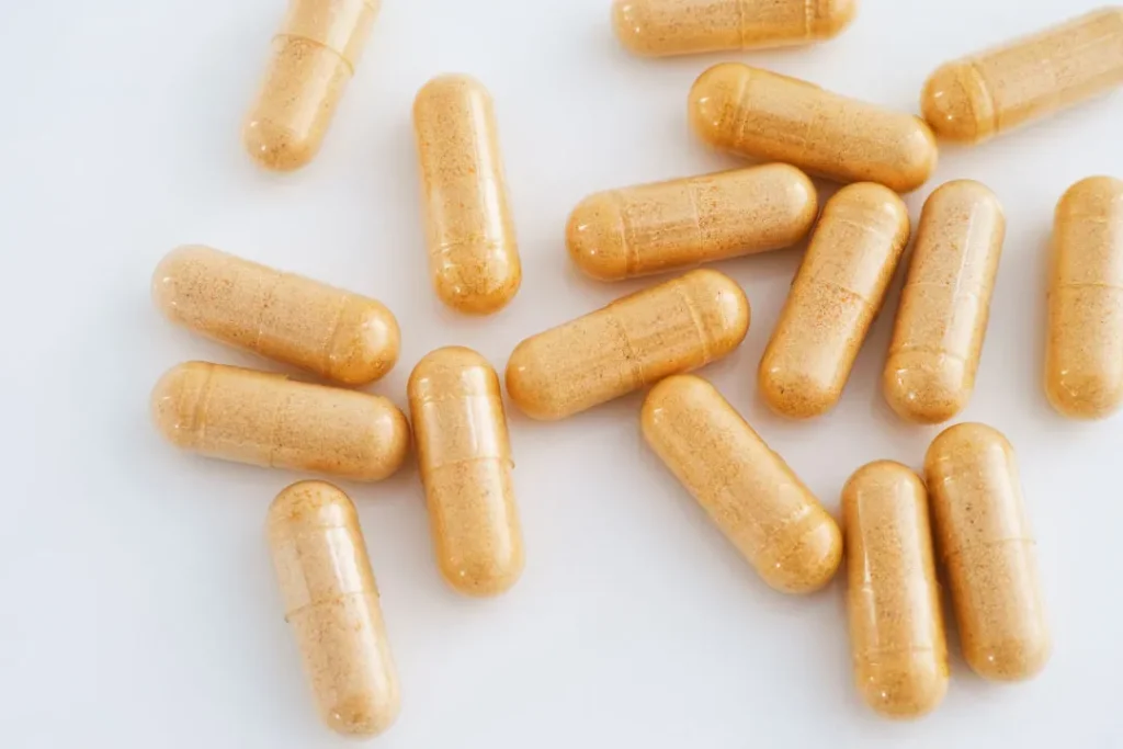 vitamin pills on white background