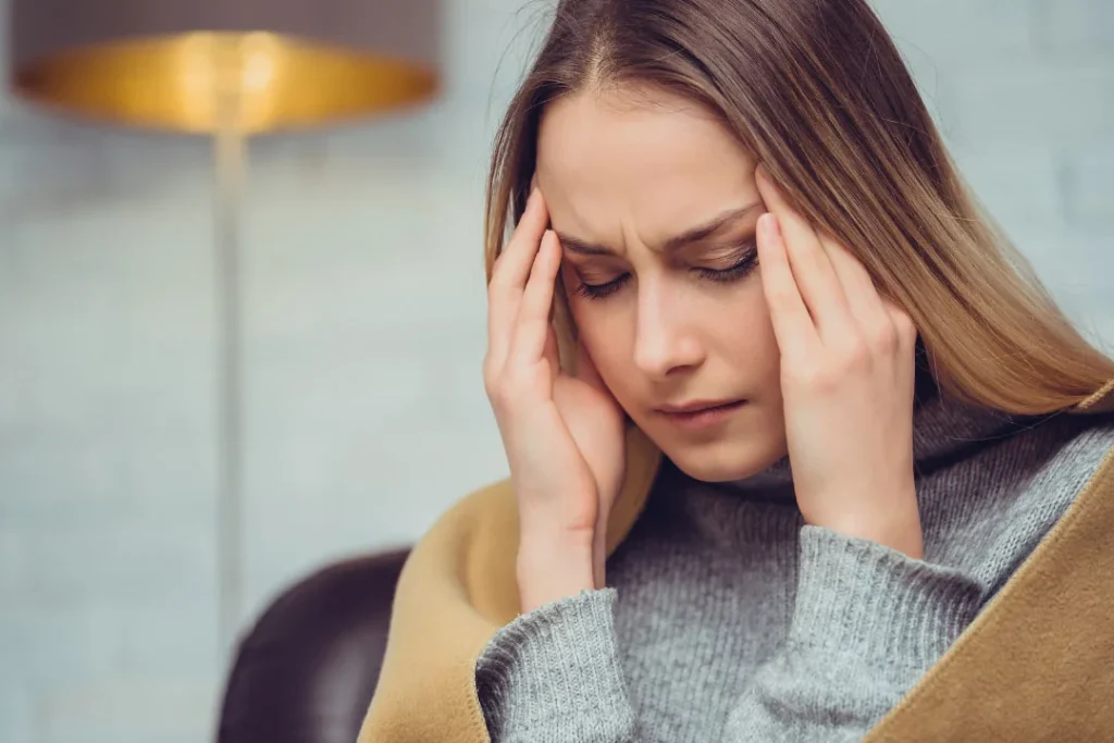 A lady going through headache. 