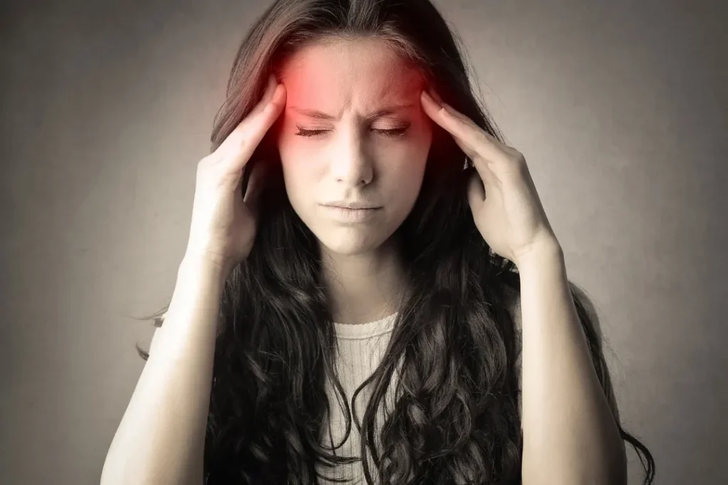 A lady facing headache.  