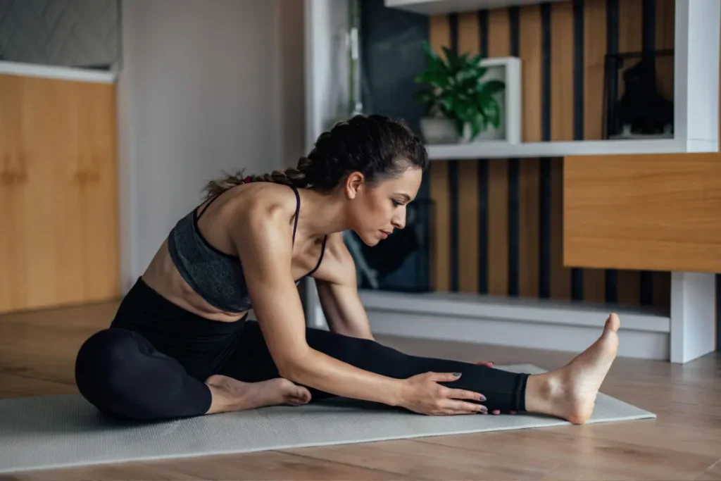 A lady is doing exercise. 