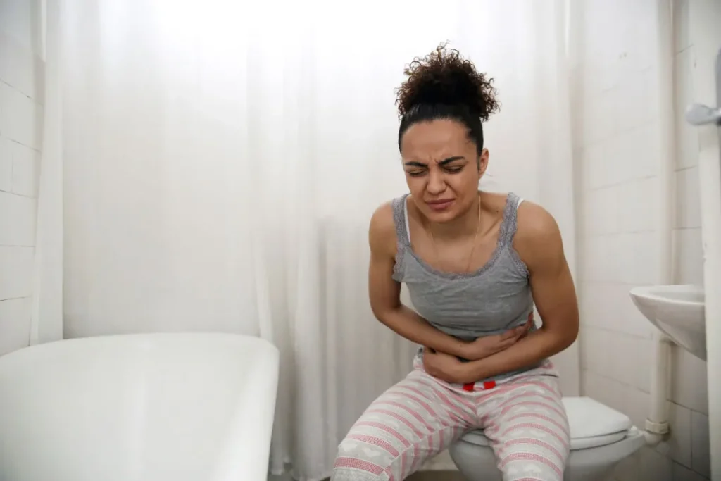 women suffering from diarrhea