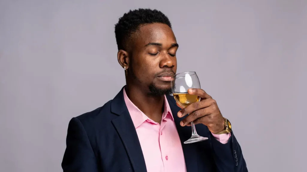 Man having a glass of wine. 
