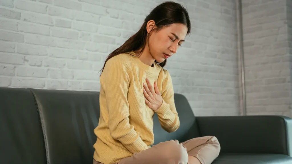 Lady having breathing issue.