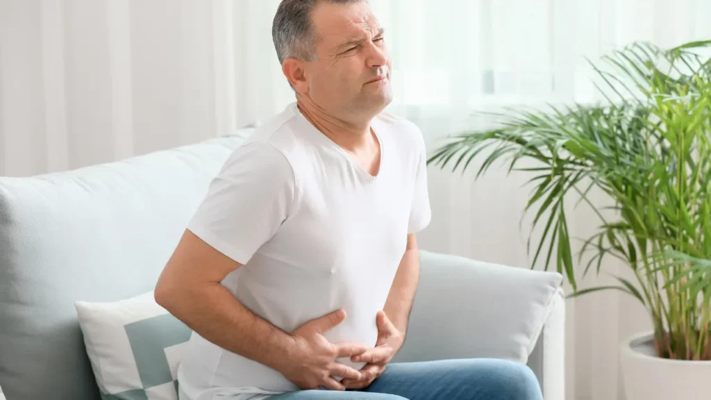 Man facing abdominal pain. 