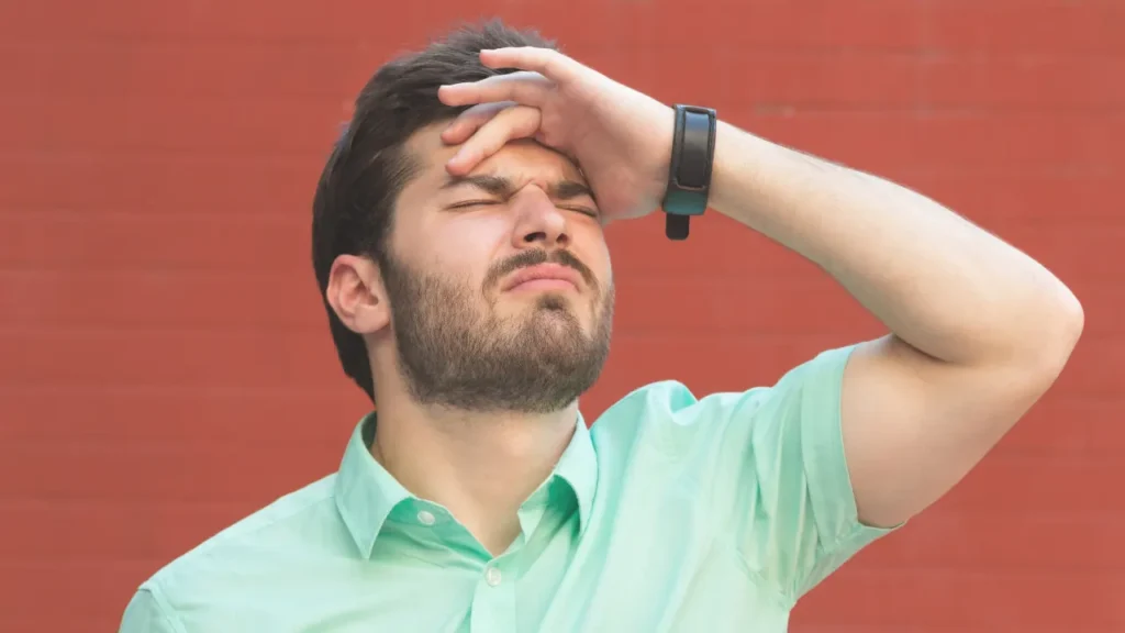 Man facing headache.