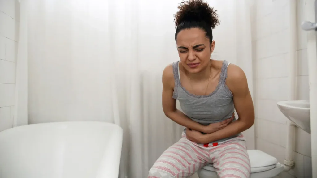 Lady having belly pain. 