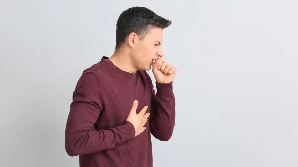 Man having cough. 