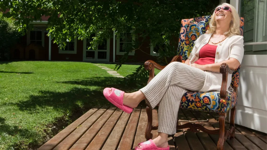 Lady sitting on the chair. 