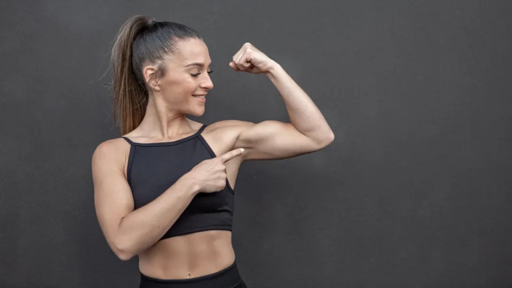 Lady having strong muscles. 