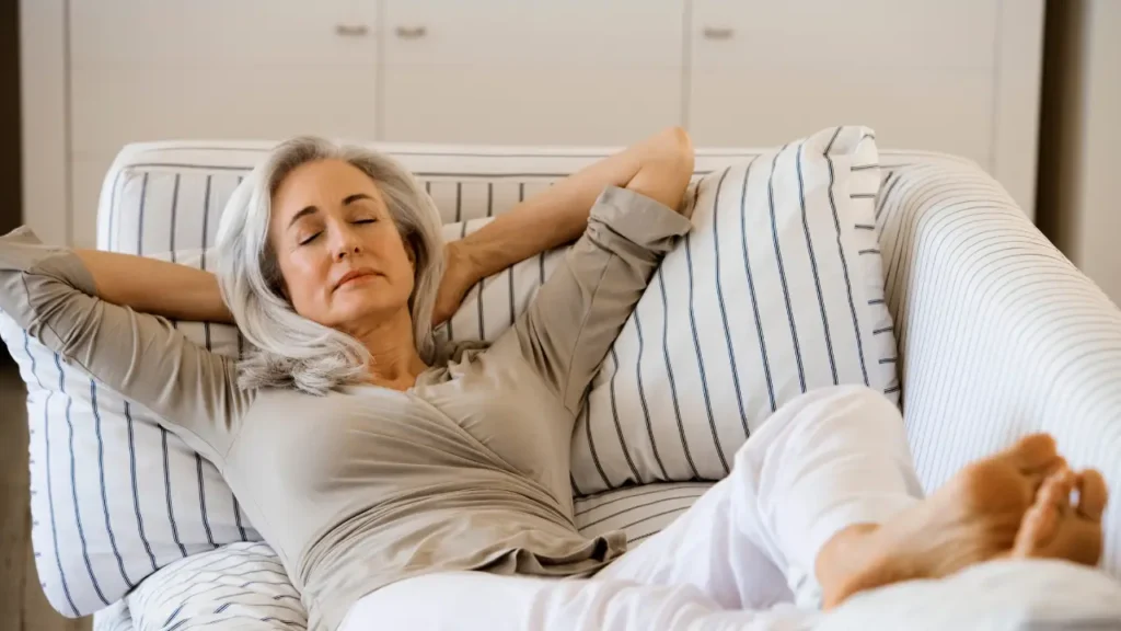 Aged woman relaxing while sleeping