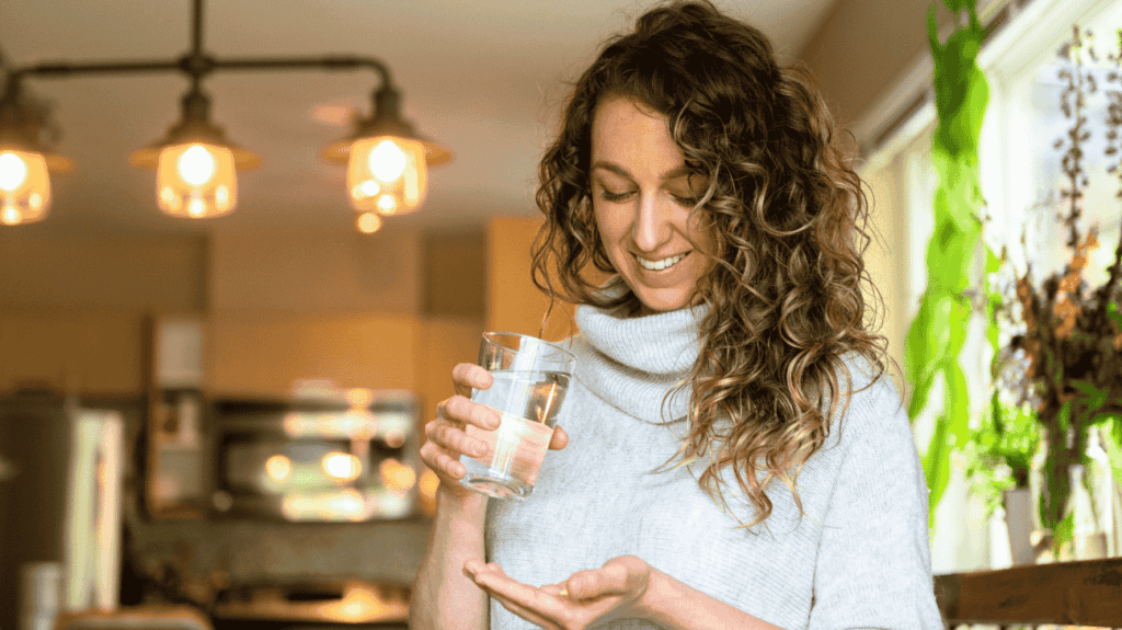 Girl taking Manchurian Thorn supplement for brain, memory and focus improvement