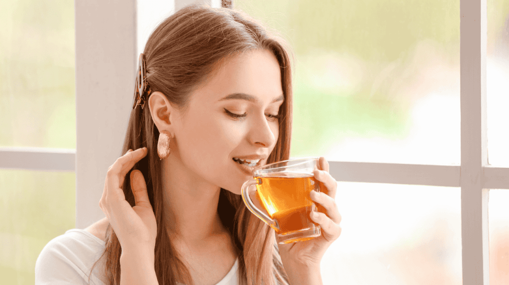 Girl taking oolong tea for brain health